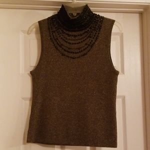 Jeweled neck line sweater.